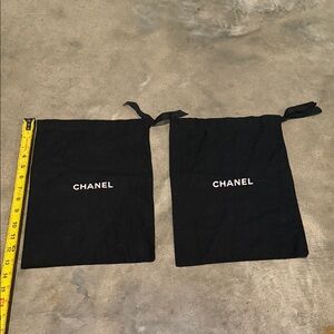Authentic CHANEL Black Drawstring Storage Pouches with White Logo (Pair)